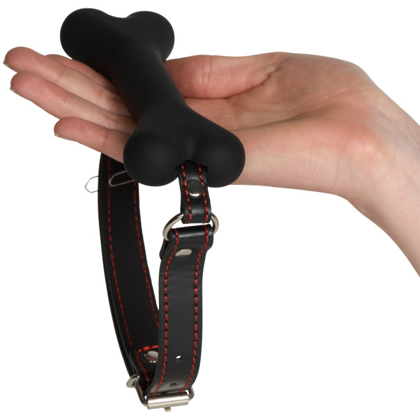 Master Series Hound Dog Bone Baîllon Image du produit avec des mains 50